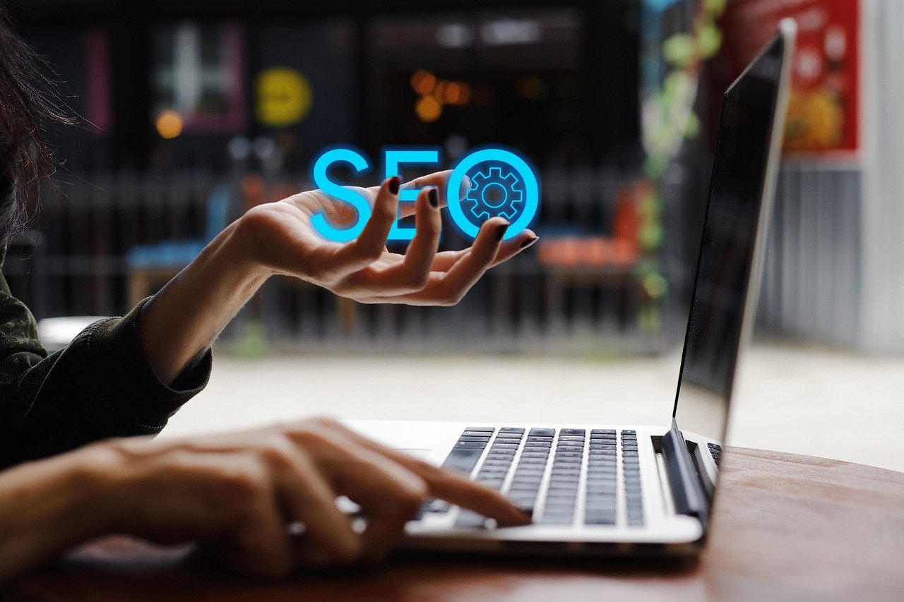 a man researching seo in front of a laptop